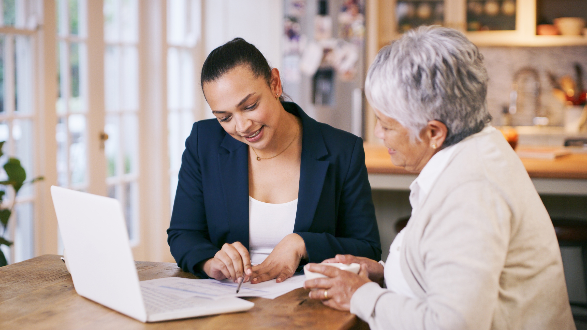 2 women reviewing a document