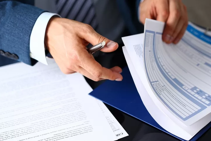 Lawyer looking through papers