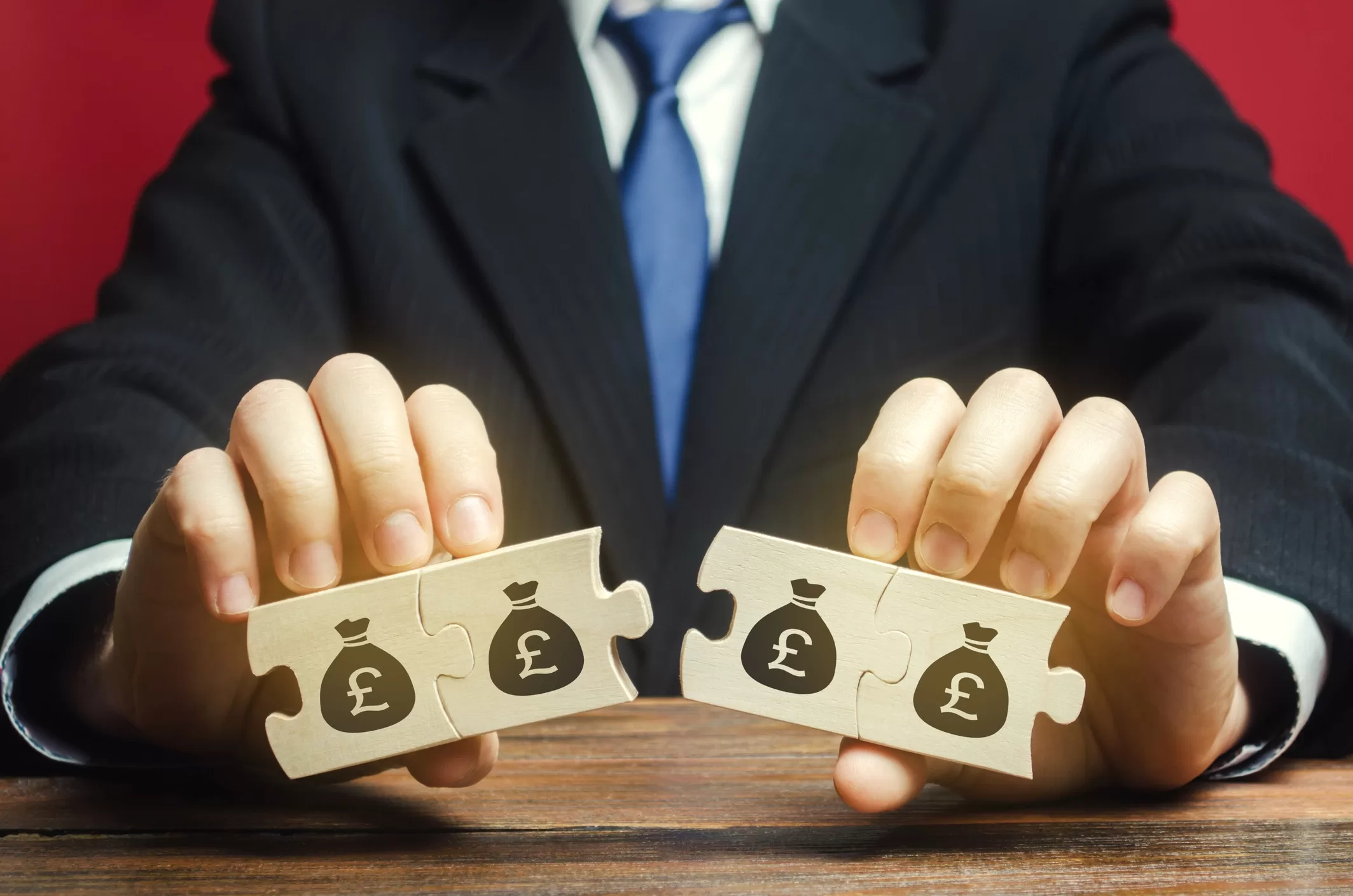Man splitting finance blocks